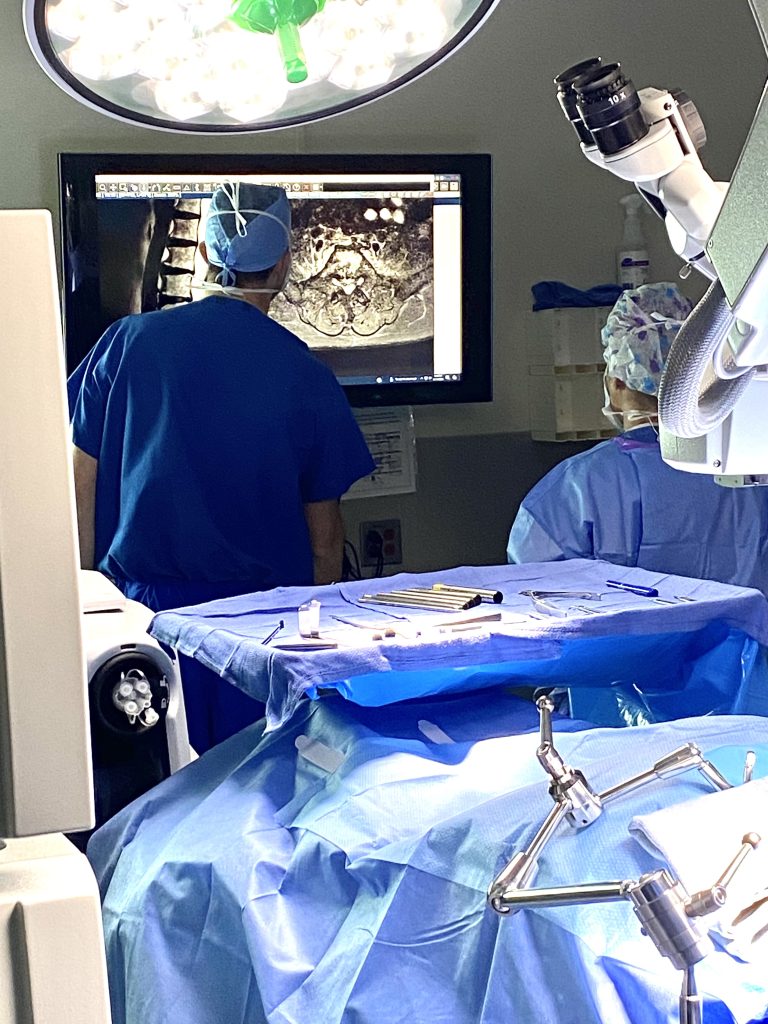 Orthopaedic surgical team using advanced 3D imaging technology during a procedure