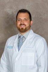Dr. Rhett MacNeille